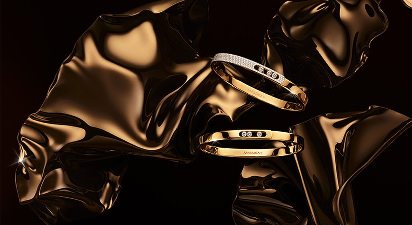 Two Messika Move Noa diamond bracelets on a gold background.